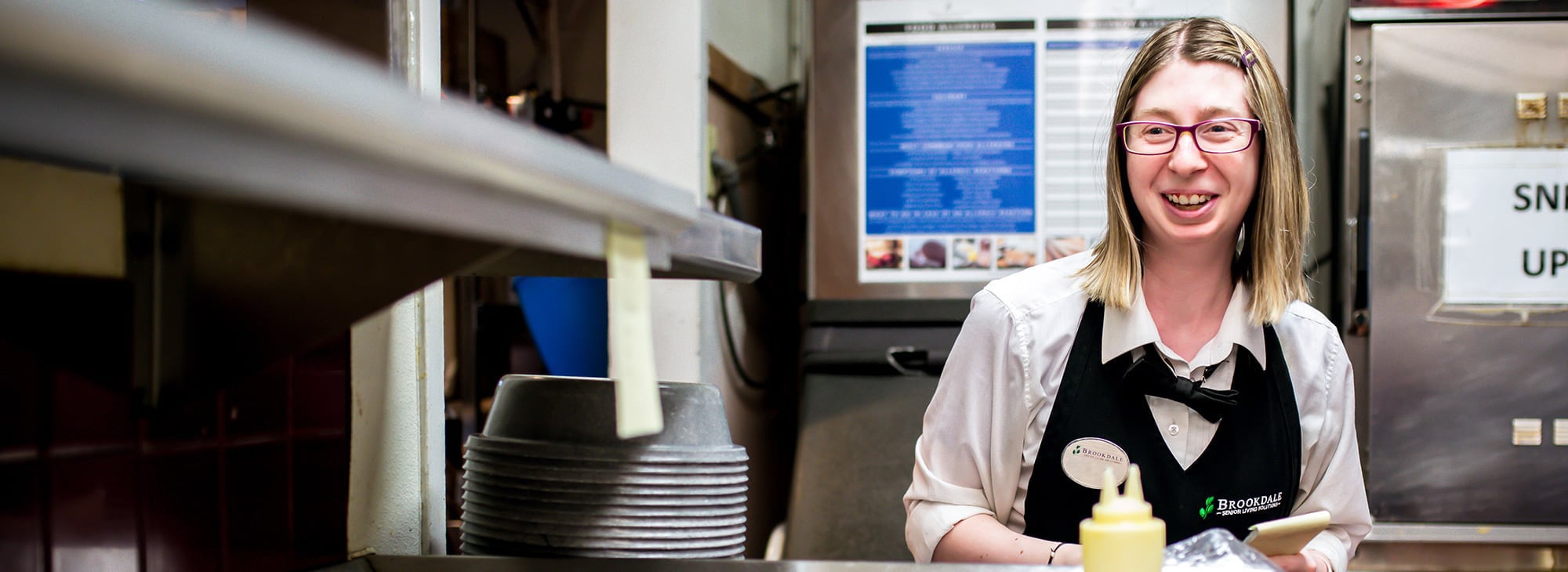 female associate in a kitchen